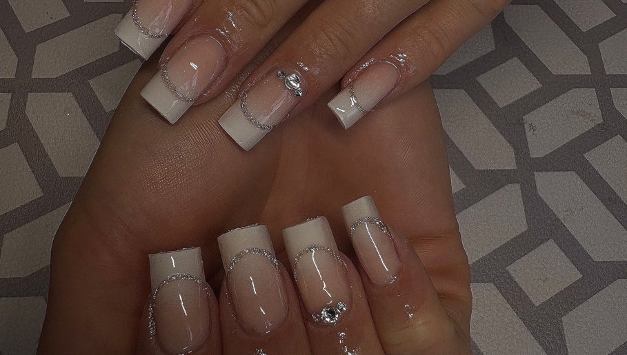 Stylish manicured nails at Honeybnails LtD, London, England, GB showcasing intricate nail art design.