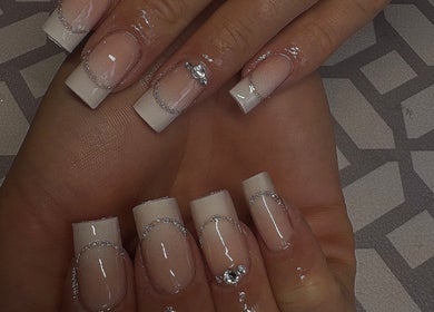 Stylish manicured nails at Honeybnails LtD, London, England, GB showcasing intricate nail art design.