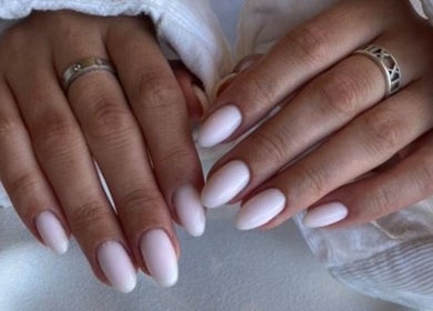 Elegant white manicure at GELuxe Nail Studio, Dapto, New South Wales, AU, showcasing refined nail art.
