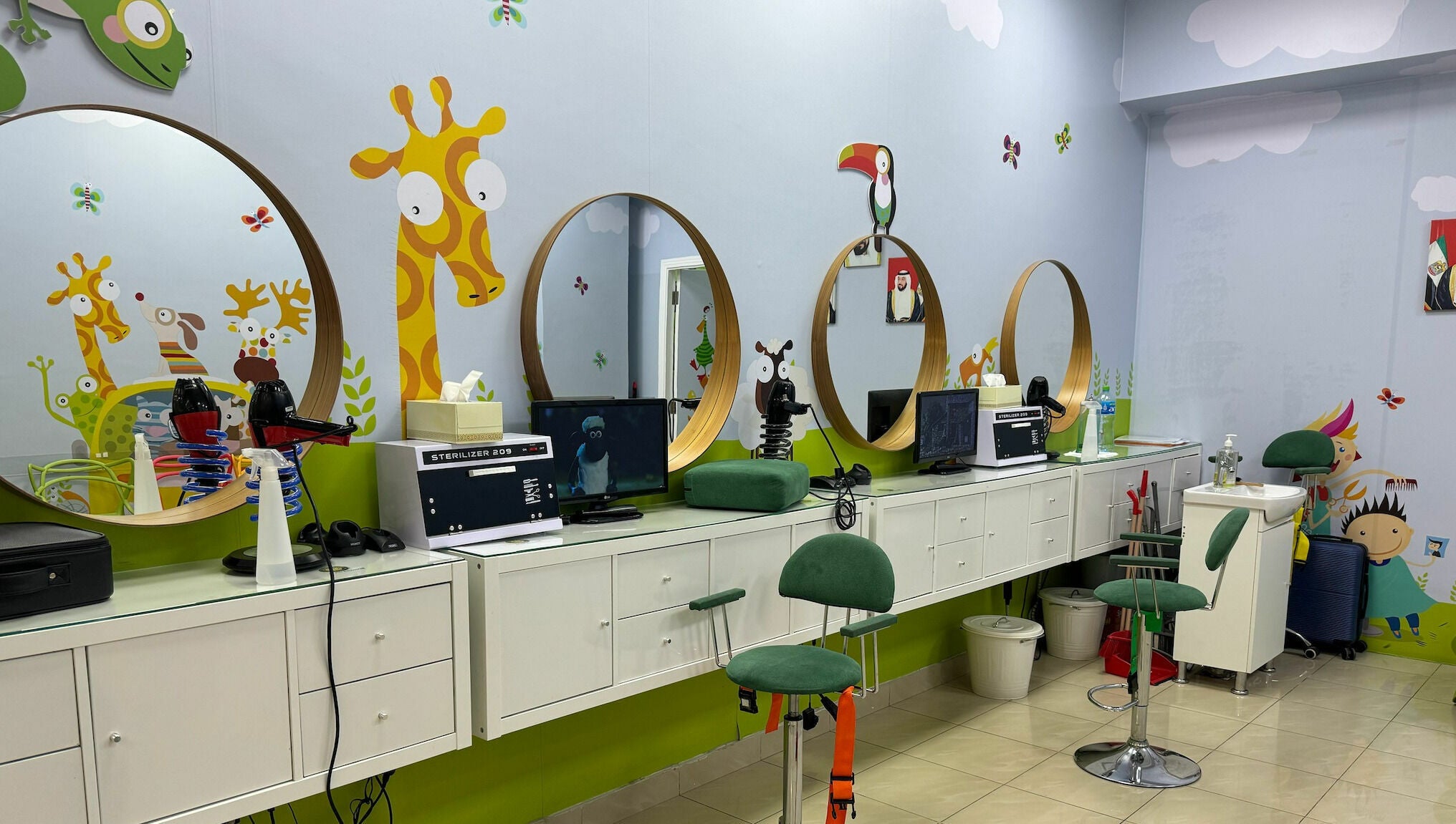 Vibrant kids salon at White Sheep Kids Salon, Abu Dhabi, AE with colorful animal-themed decor.