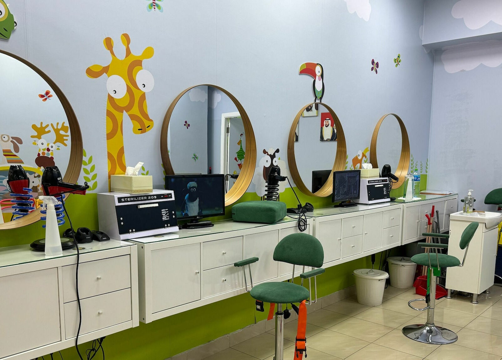 Vibrant kids salon at White Sheep Kids Salon, Abu Dhabi, AE with colorful animal-themed decor.