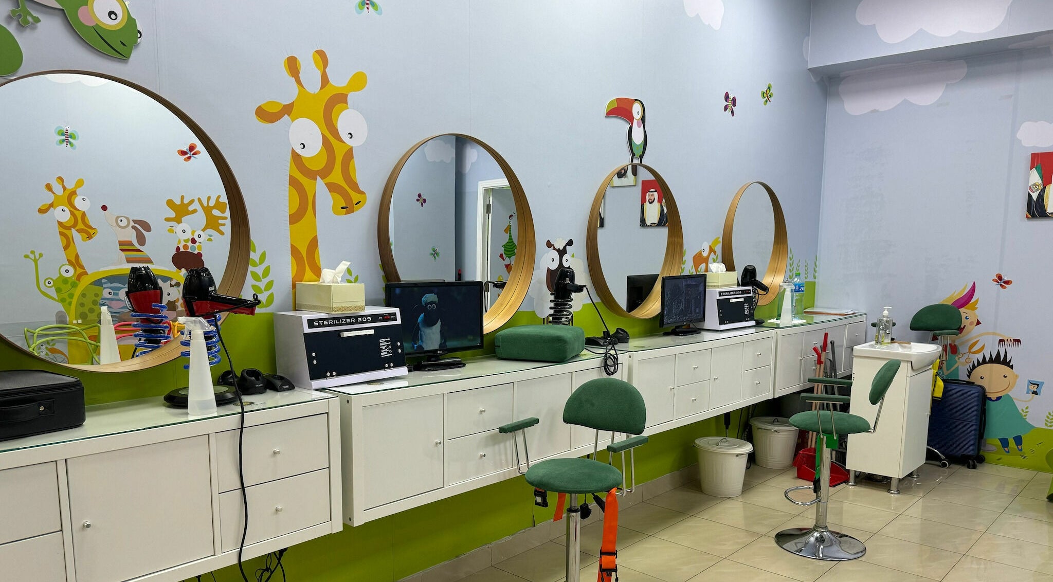 Vibrant kids salon at White Sheep Kids Salon, Abu Dhabi, AE with colorful animal-themed decor.