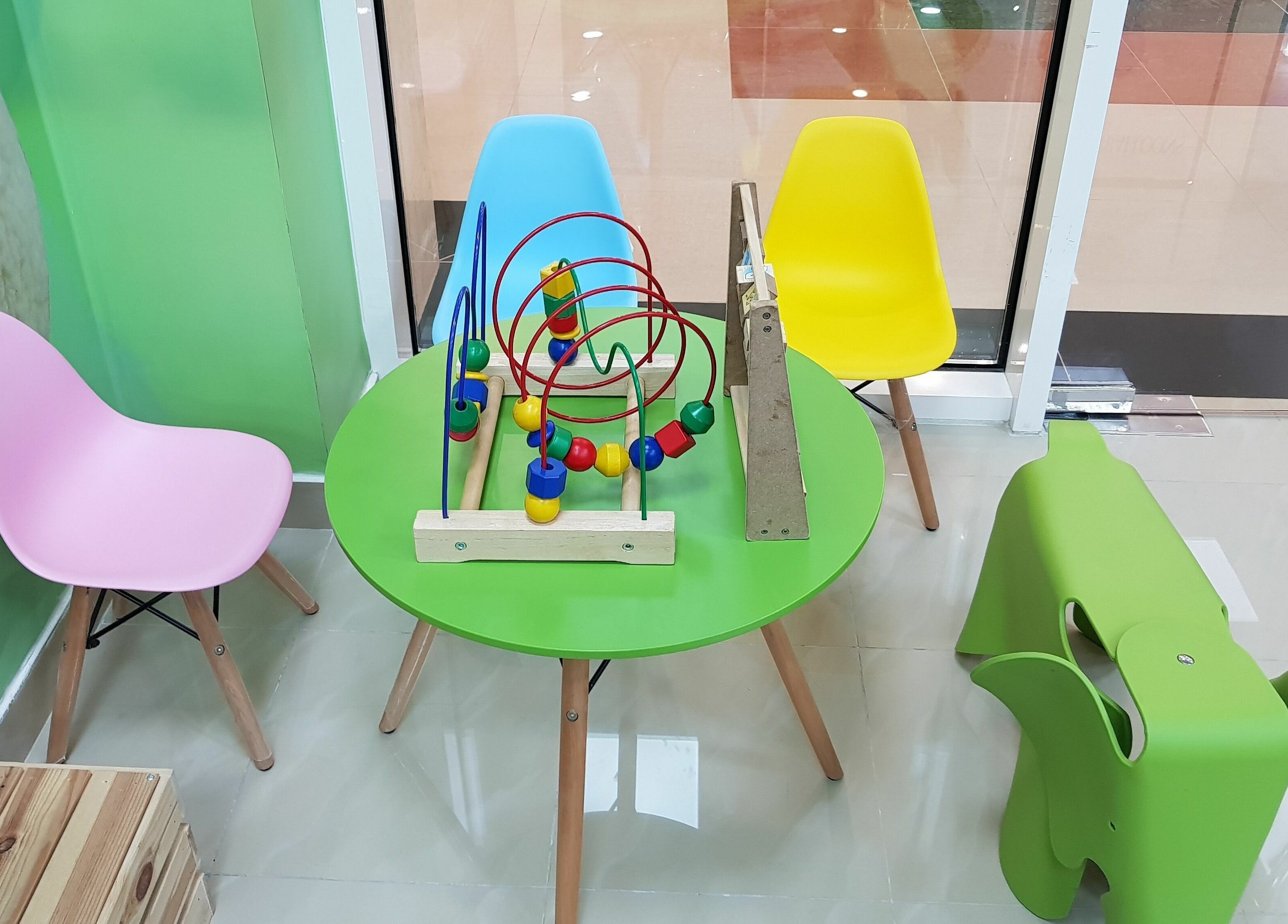 Colorful kids' seating area at White Sheep Kids Salon, Abu Dhabi, Abu Dhabi, AE.