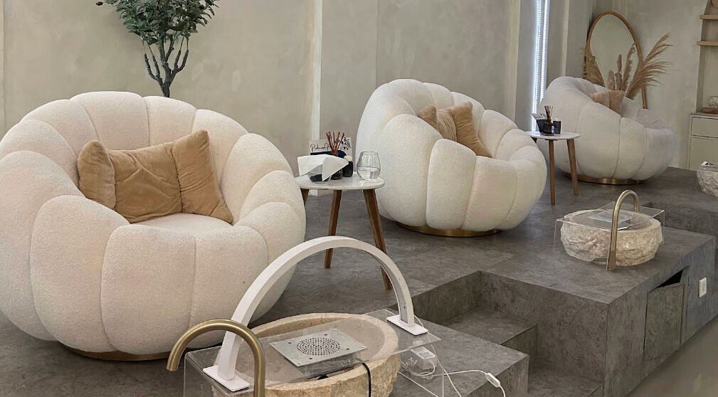 Elegant seating at Boho Bliss, Bali, Bali, ID, offers plush comfort in a serene, modern setting.