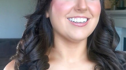 Woman with styled brunette curls smiling at Galway, County Galway, County Galway, IE salon.