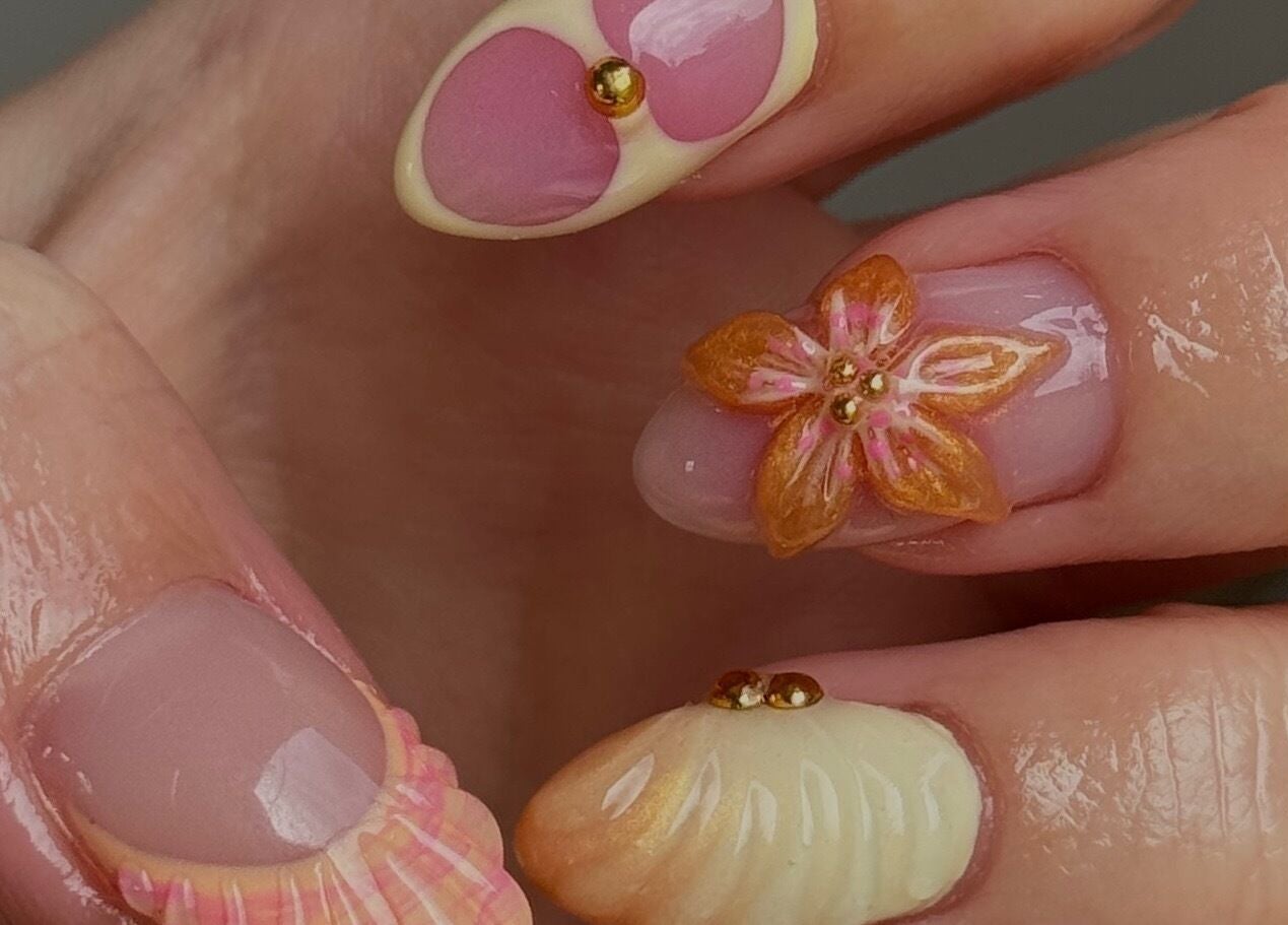 Elegant nail art featuring flowers at Gel Serenity, Advancetown, Queensland, AU.