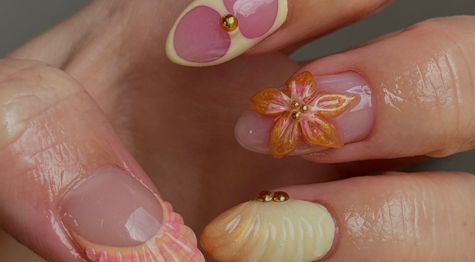 Elegant nail art featuring flowers at Gel Serenity, Advancetown, Queensland, AU.
