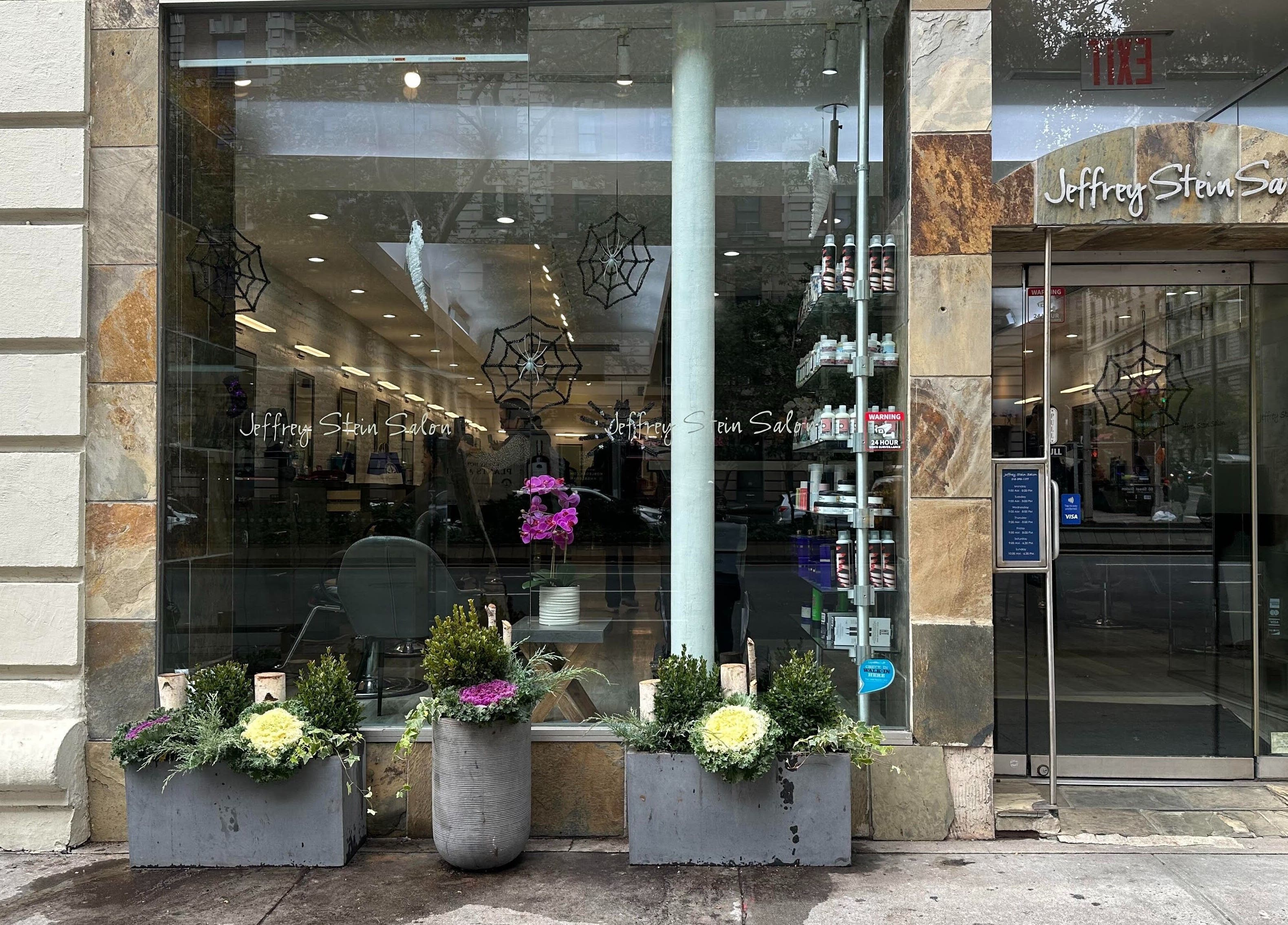 Chic exterior of Jeffrey Stein Salon in New York, New York, US with inviting glass windows and stylish decor.