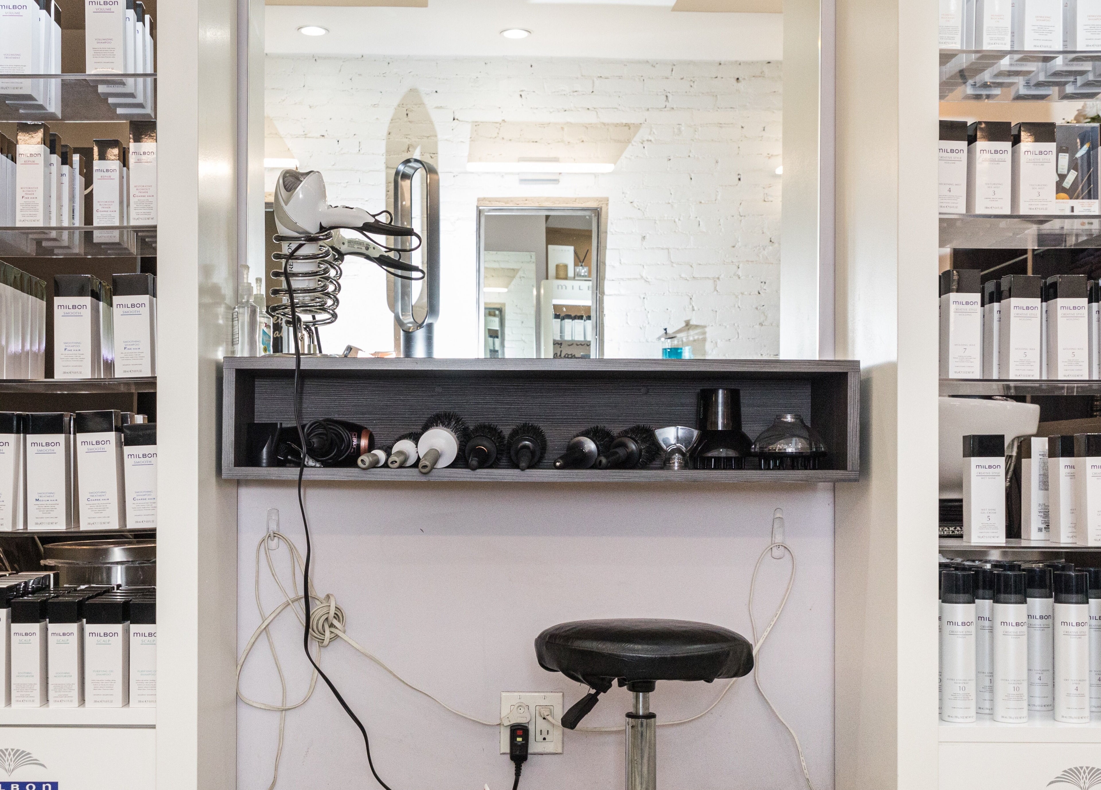 Hair styling tools and products at Jeffrey Stein Salon, New York, New York, US, showcasing professional equipment.