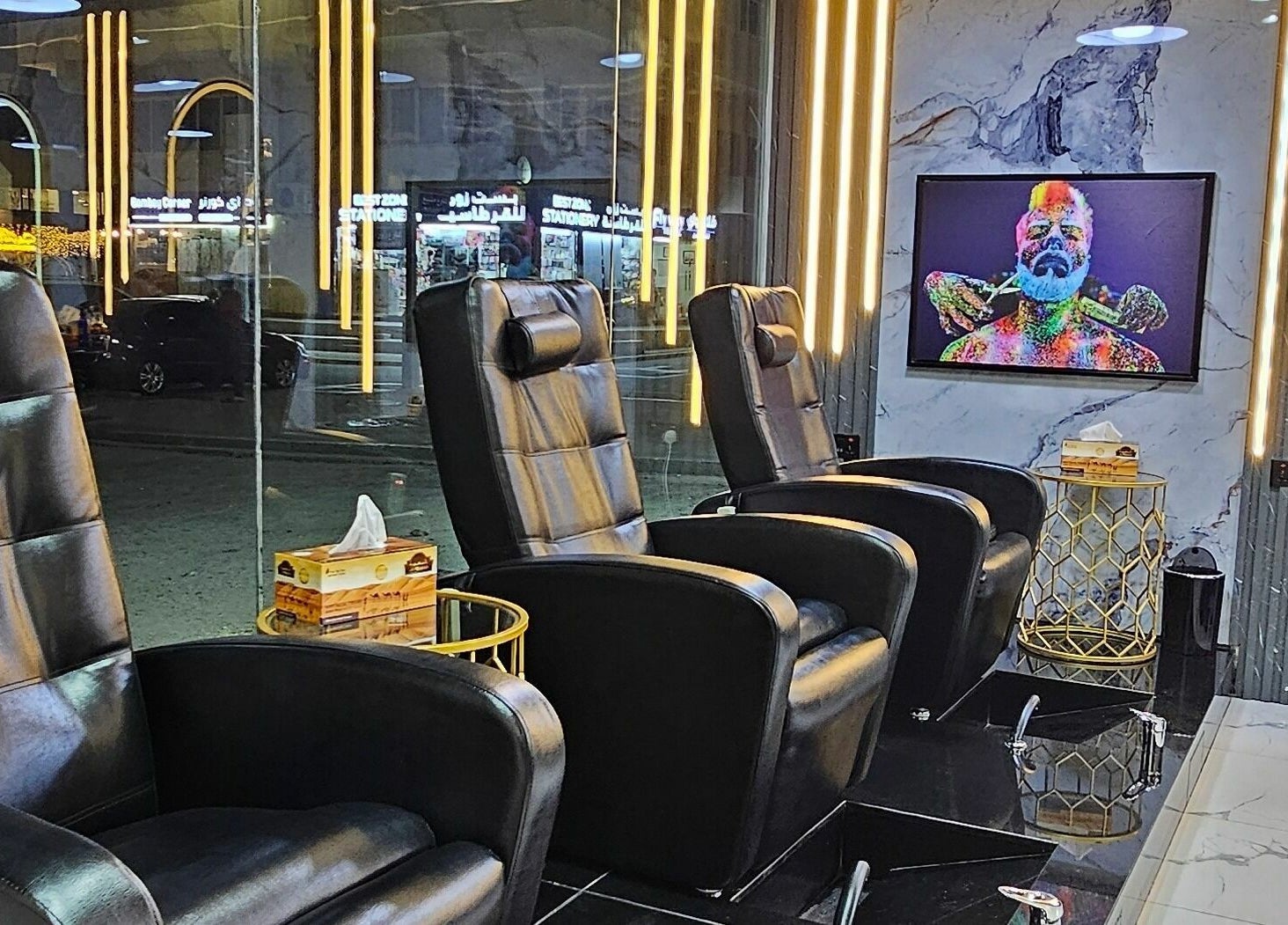 Luxurious seating area at San Giorgio Gents Salon, أبو ظبي, أبو ظبي, AE, with modern decor and stylish chairs.