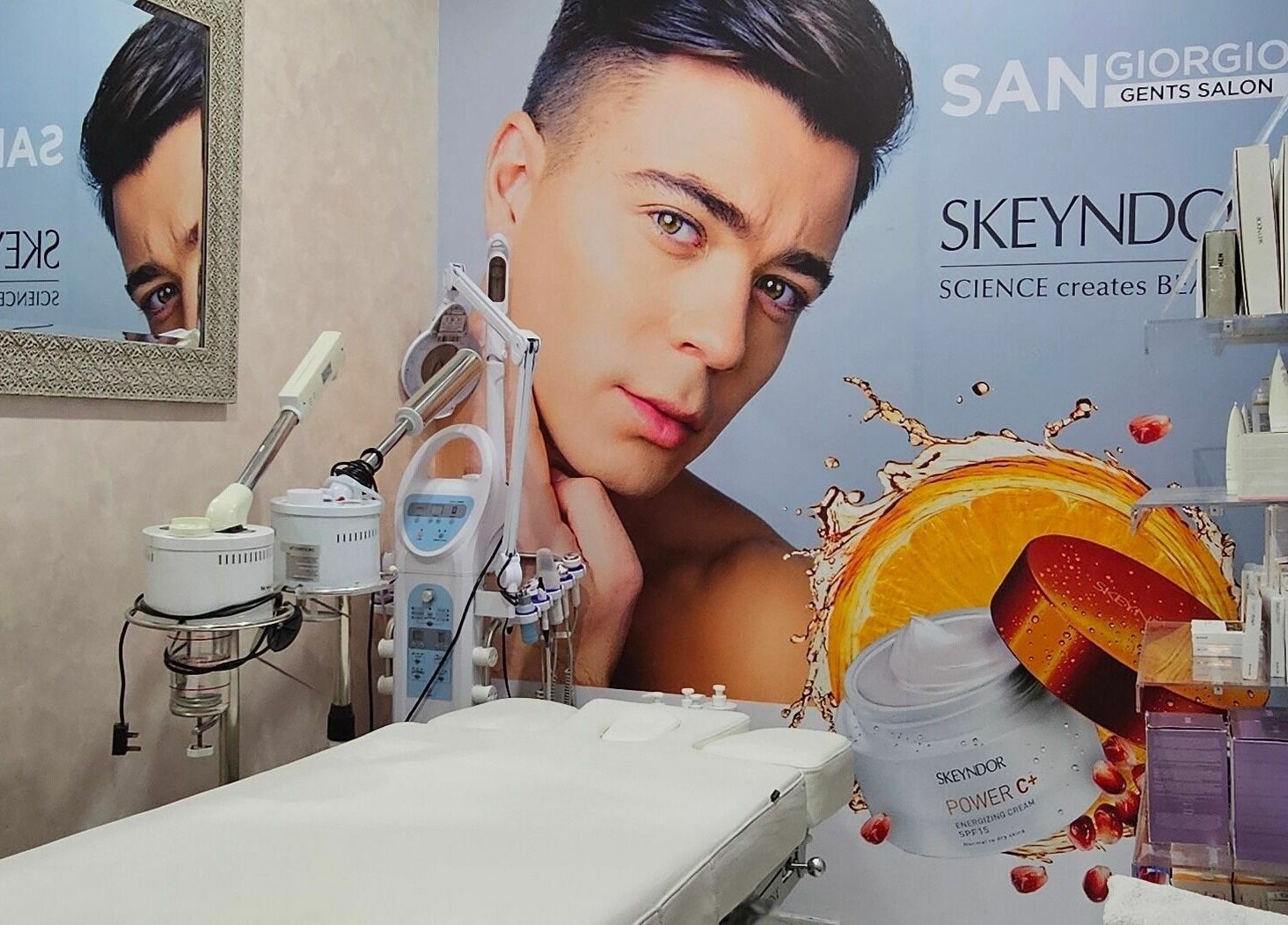 San Giorgio Gents Salon treatment room in Abu Dhabi featuring skincare products and modern equipment.