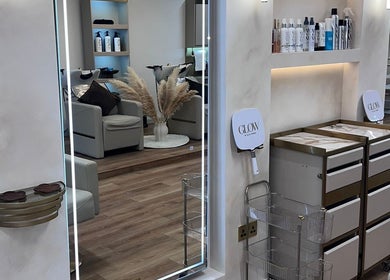 Interior of Beauty by Harriet - Glow Hair Salon, Crownhill, England, GB with modern decor and hair products.