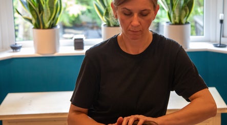 Therapist performing massage at Elemental Balancing, Bristol, England, GB.