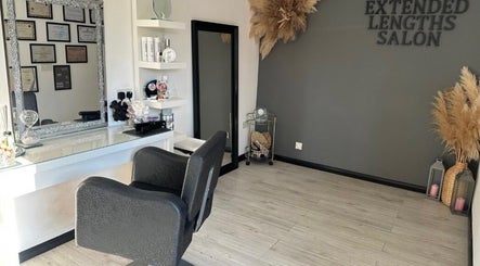 Modern interior of Extended Lengths Salon in Grays, England, GB with stylish decor and comfortable seating.