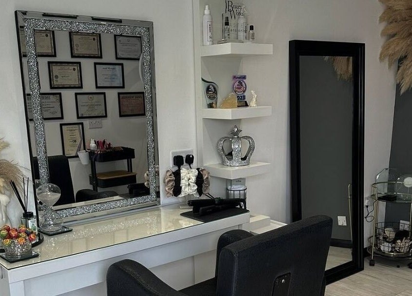 Elegant styling station at Extended Lengths Salon, Grays, England, GB with mirrors and decor.