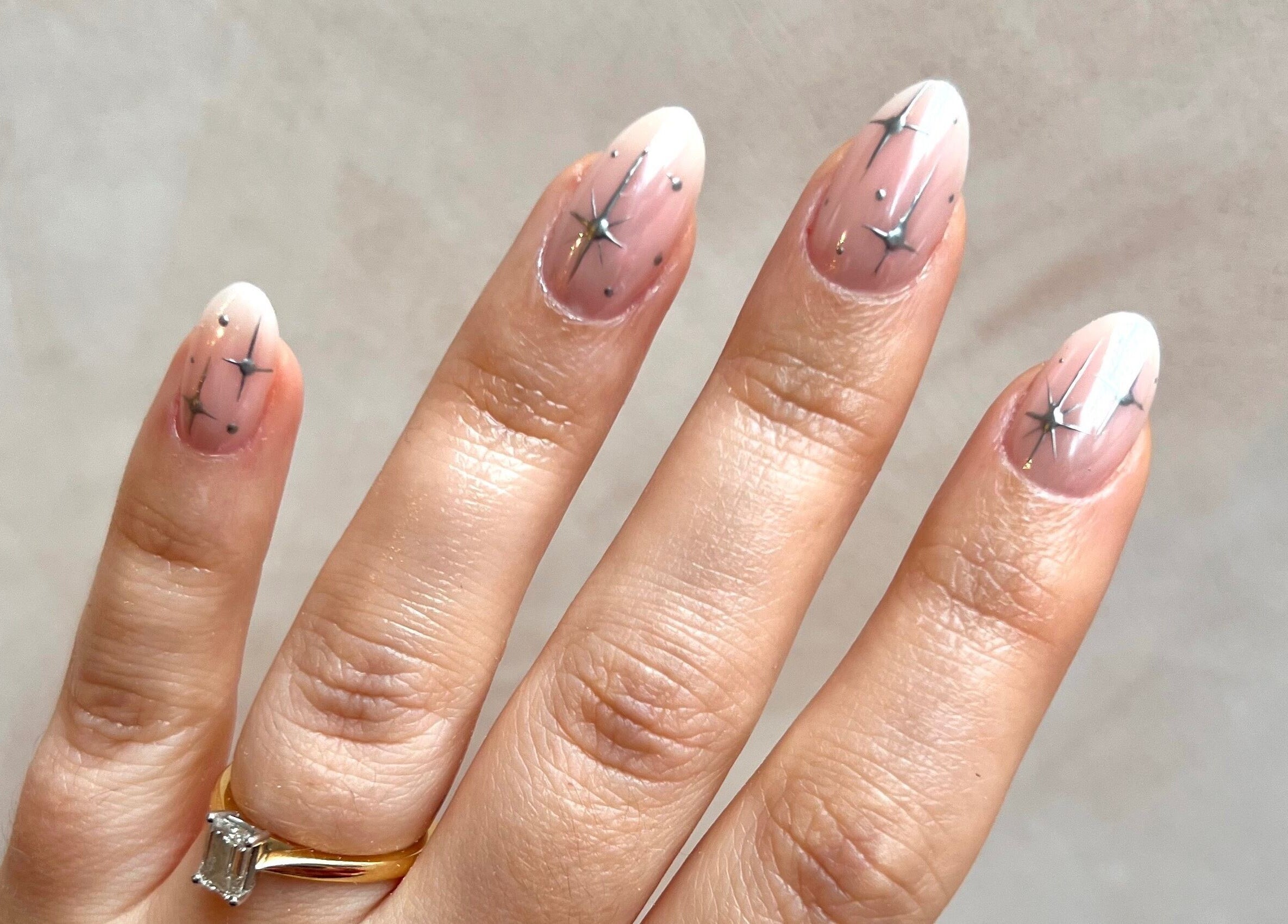 Starry nail art design by Dia Nailed It in Hove, England, GB, showcasing elegant minimalist style.