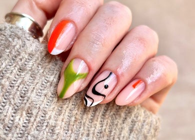 Stylish nail art with vibrant colors at Dia Nailed It, Hove, England, GB, showcasing creative design.