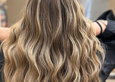 Beautiful wavy hairstyle at Iris Hair Design at L'Attitudes EMTC, Mississauga, Ontario, CA.