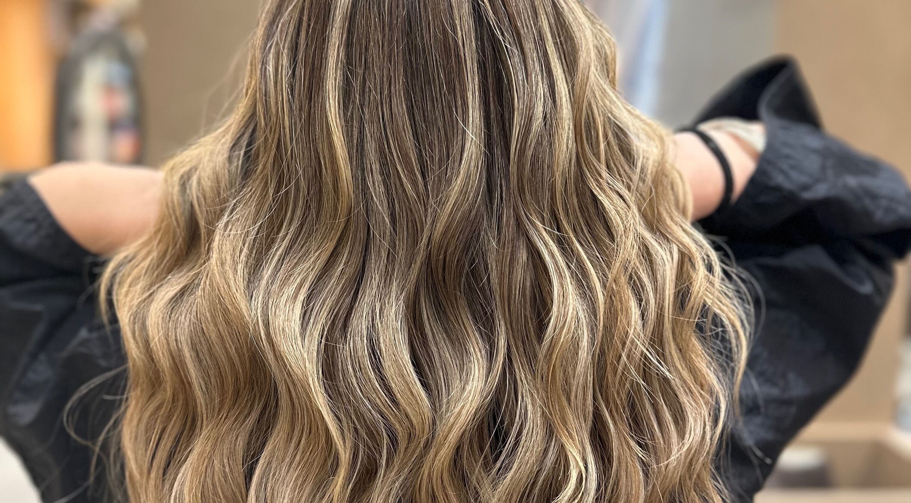 Beautiful wavy hairstyle at Iris Hair Design at L'Attitudes EMTC, Mississauga, Ontario, CA.