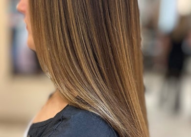 Smooth, shiny hair styled at Iris Hair Design at L'Attitudes EMTC in Mississauga, Ontario, CA.