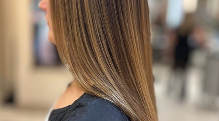 Smooth, shiny hair styled at Iris Hair Design at L'Attitudes EMTC in Mississauga, Ontario, CA.