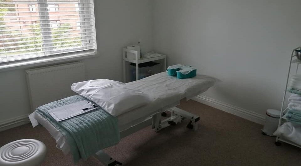 Peaceful treatment room at Allfit Holistics, Fareham, England, GB, offers a serene relaxation experience.