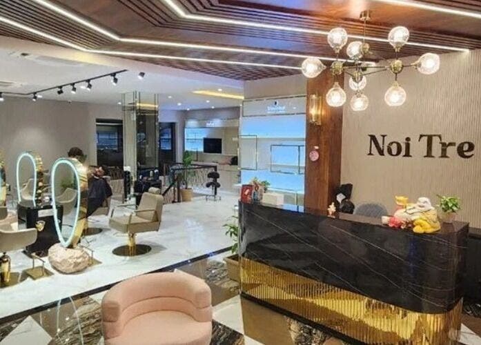 Chic interior of Curl Care - Noi Tre Ashok Vihar in Delhi, Delhi, IN, featuring modern salon seating and lighting.