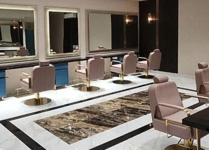 Modern salon with stylish chairs at Curl Care - Noi Tre Ashok Vihar, Delhi, Delhi, IN, showcasing luxury.