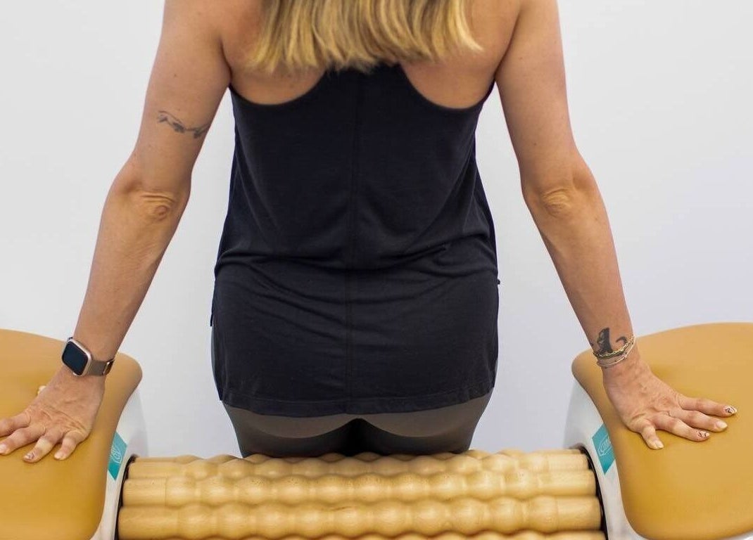 Person enjoys massage therapy at GlowFit Wellness in Melbourne, Victoria, AU; enhancing relaxation and wellness.