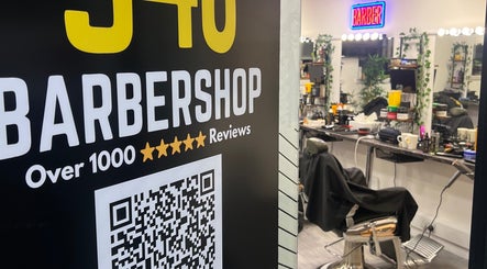 Interior of 346 Barbershop - Oxford Road - Manchester City Centre, showcasing a modern styling area. Manchester, England, GB.