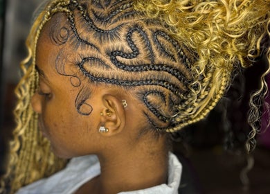 Intricate braids hairstyle at GoldPosh Beauty Parlour in Bridgetown, Saint Michael, BB.