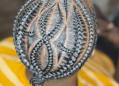 Intricate braided hairstyle at GoldPosh Beauty Parlour, Bridgetown, Saint Michael, BB.