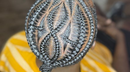 Intricate braided hairstyle at GoldPosh Beauty Parlour, Bridgetown, Saint Michael, BB.
