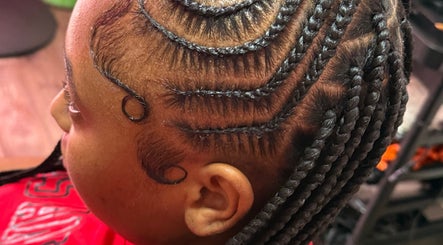 Intricate braid design at GoldPosh Beauty Parlour showcasing stylish hair artistry in Bridgetown, Saint Michael, BB.