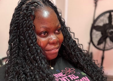 Woman with beautiful curls at GoldPosh Beauty Parlour, Bridgetown, Saint Michael, BB.