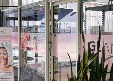 Entrance of Glam Body in Penrith, New South Wales, AU featuring a stylish banner and modern decor.