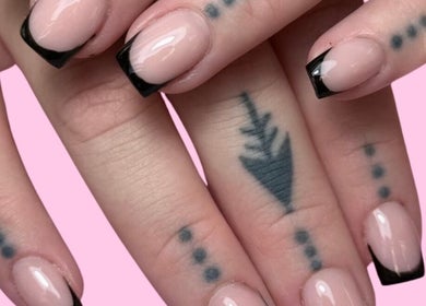 Elegant black-tipped nails at Glam Body in Penrith, New South Wales, AU, showcasing expert manicure skills.