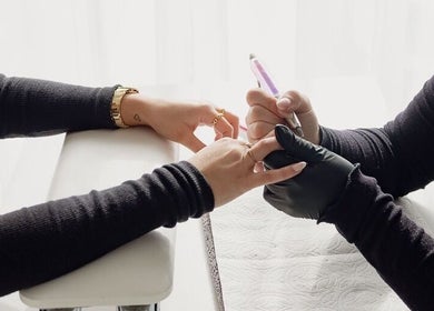 Nail technician at Saesha Nails and Beauty providing a manicure in Melbourne, Victoria, AU.