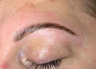 Expertly shaped eyebrow at Zena Beauty at Nouvelles Hair & Beauty, Epsom, England, GB. Flawless arch and detail.