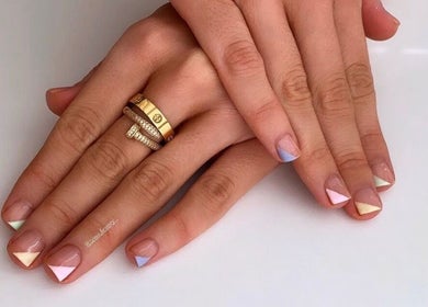 Stylish pastel nail art at Zena Beauty at Nouvelles Hair & Beauty, Epsom, England, GB.