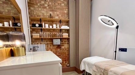 Serene treatment room at Facials by MS in Sutton, England, GB with stylish décor and soothing lighting.