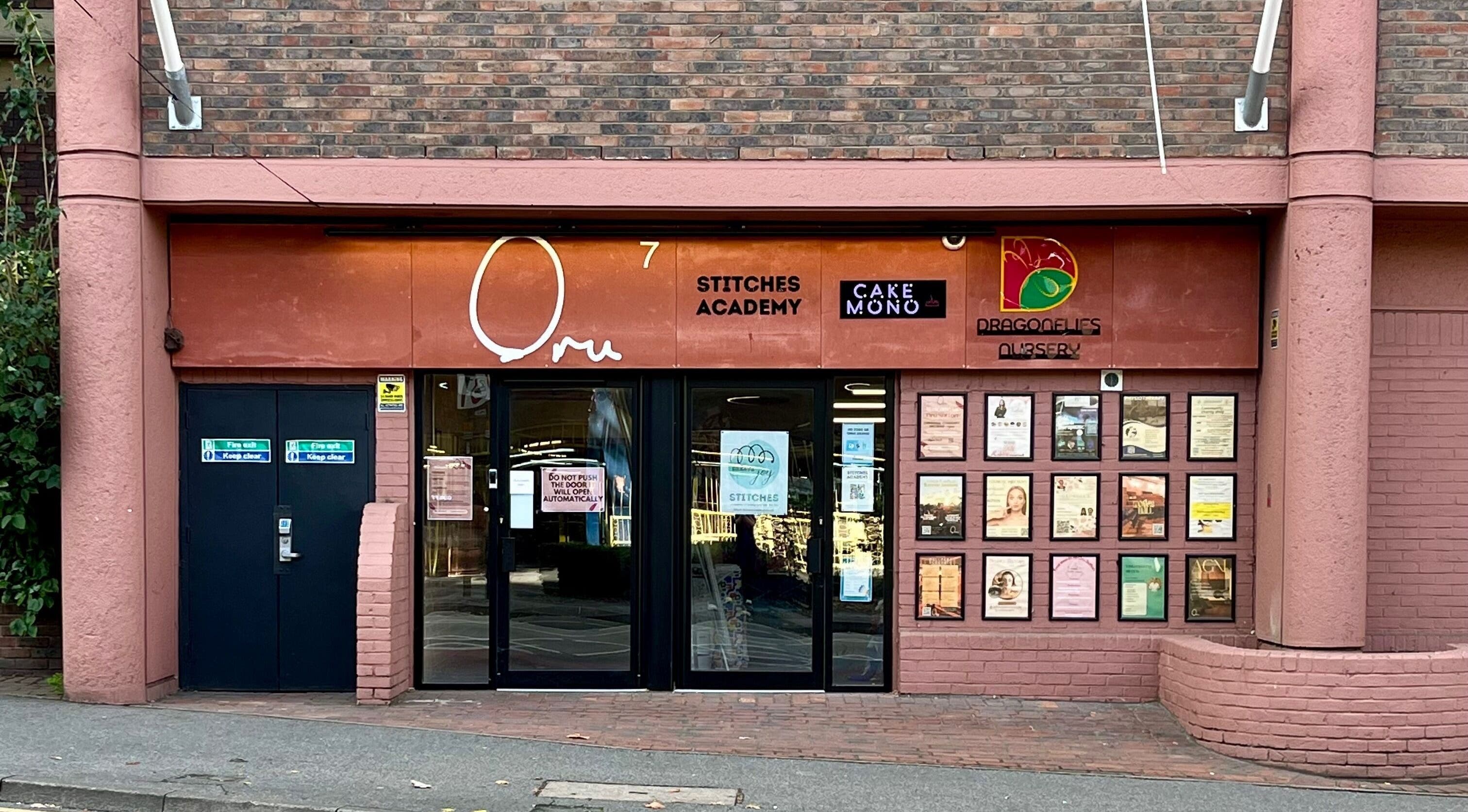 Street view of Facials by MS exterior in Sutton, England, GB with large glass doors and signage.