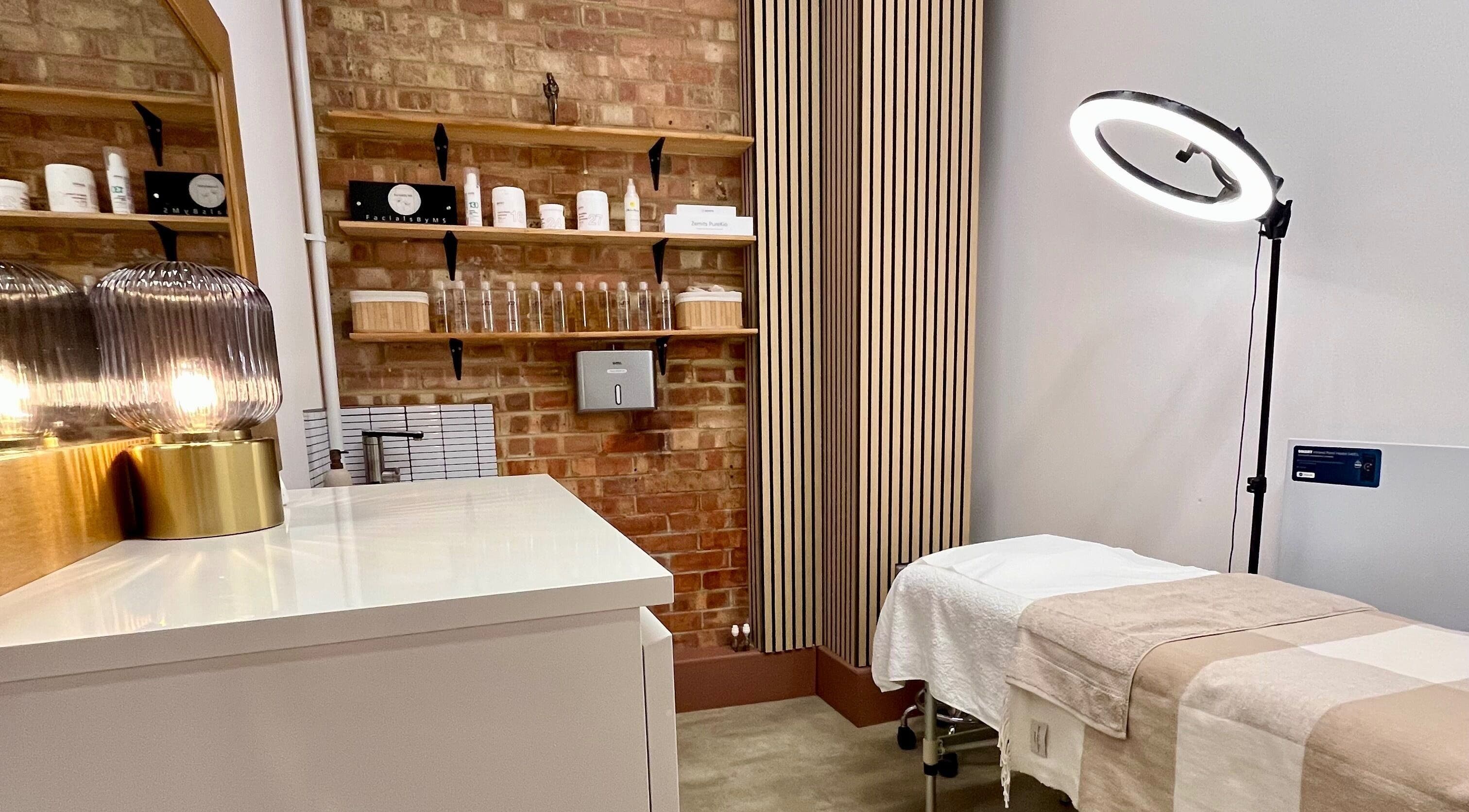 Facials by MS cozy treatment room with ambient lighting in Sutton, England, GB.