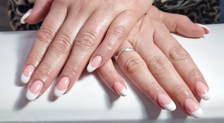 Beautiful French manicure at Lisa Luxe Treatments, Birmingham, England, GB. Showcasing elegance and precision.