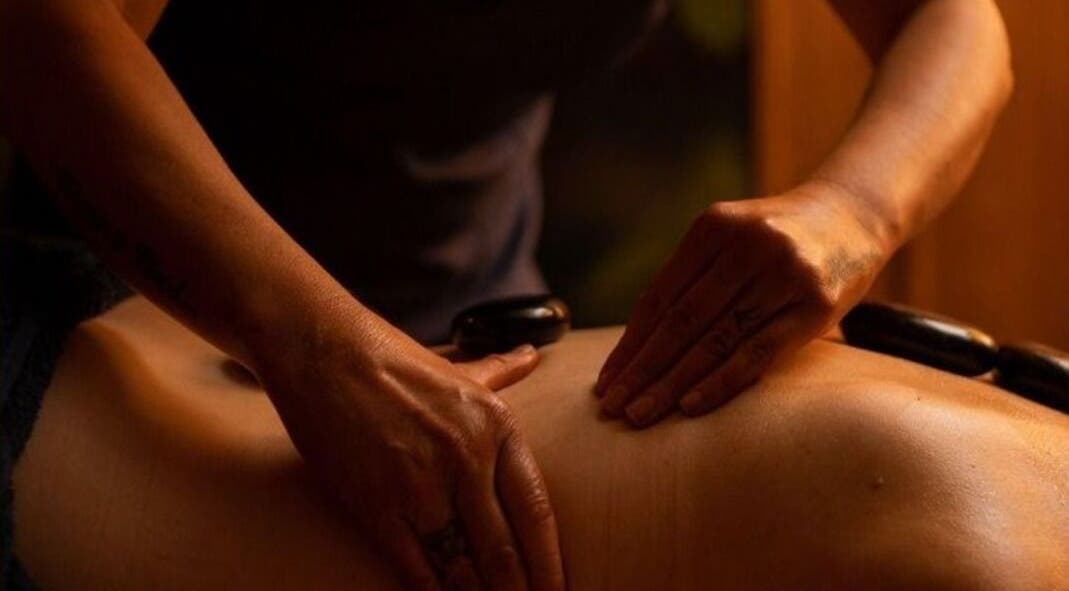 Relaxing hot stone massage at Jun Lin Spa - Rosny Park, Tasmania, AU, enhancing wellness and serenity.