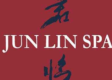 Jun Lin Spa - Glenorchy logo featuring elegant script on a red circle. Located in Glenorchy, Tasmania, AU.