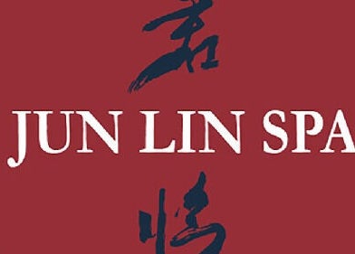 Jun Lin Spa - Glenorchy logo featuring elegant script on a red circle. Located in Glenorchy, Tasmania, AU.