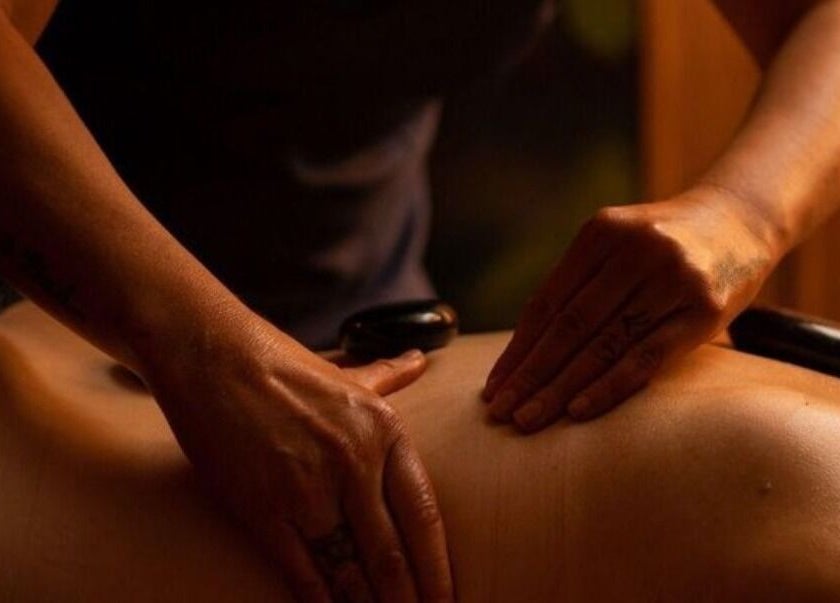 A relaxing hot stone massage at Jun Lin Spa - Glenorchy, Glenorchy, Tasmania, AU enhancing well-being.