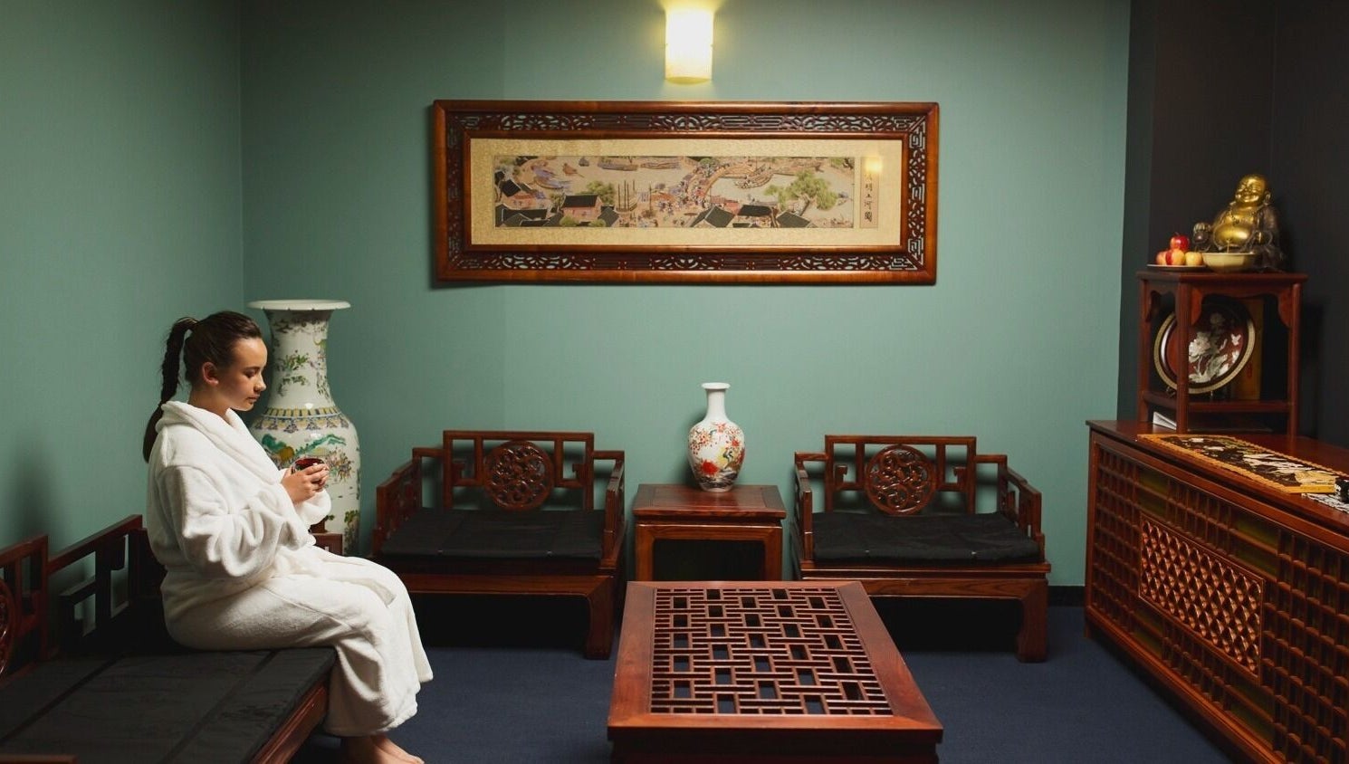 Relaxing lounge at Jun Lin Spa - Rosny Park, featuring traditional decor and calming ambiance. Rosny Park, Tasmania, AU.