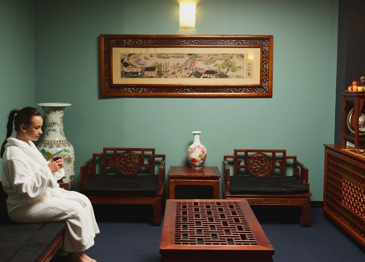 Relaxing lounge at Jun Lin Spa - Rosny Park, featuring traditional decor and calming ambiance. Rosny Park, Tasmania, AU.